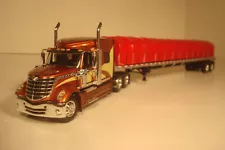 DCP INTERNATIONAL LONESTAR SEMI TRACTOR WITH COT FLATBED COVERED LOAD TRAILER