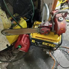 antique chainsaw,red,1950'S,brand is mall,good condition..