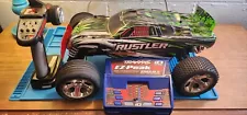 Used modified Traxxas Rustler and EZ Peak dual charger for sale