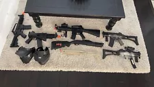 Lot Of Airsoft Electric And Spring Guns - SG Commando, Shotgun, Masks - READ