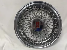 (1) OEM 1981-1988 Oldsmobile Cutlass Supreme 14" Wire Spoke Hubcap Wheel Cover