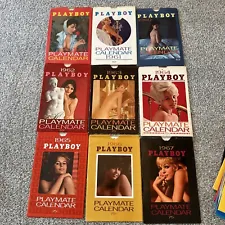 PLAYBOY WALL CALENDARS AND ENVELOPES Lot of 26 from (1959 to 1985).