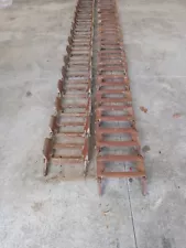 BOBCAT/SKIDSTEER METAL TRACKS -FITTED FOR 12" TIRES