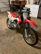 2017 Honda crf 150cc. Red and white.