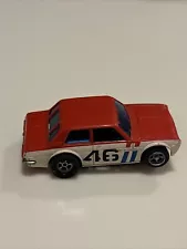 AFX SRT CHASSIS #46 RED/WHT DATSUN 510 HO SLOT CAR