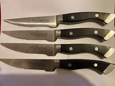 Four LONGHORN STEAKHOUSE Steak Knives, heavy weighted, w/ Logo, Serrated 10.75"