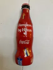 Coke promotional 8 ounce bottle. full & unopened. A scarce keeper