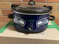 Seattle Seahawks crock-pot with snap on lid for travel.