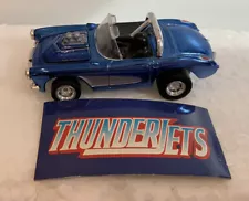 Johnny Lightning Thunder Jets dark blue 1957 Corvette. 1:64. Pull-back