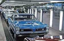 1966 Pontiac GTO coming off final assembly line 7 x 11 photograph