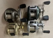 4 baitcasting reels right hand lot Quantum, Bass Pro, Pflueger & Daiwa