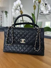 Chanel Maxi Flap Bag with Top Handle Black