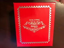 Disney point of sale containers for sterling silver jewelry. Red box Disney logo