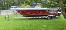 Center console boat two 225hp motors, brand new t top, boat trailer included