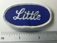 Little Embroidered Name Oval Sew-On Patch Italicized White Letters on Blue