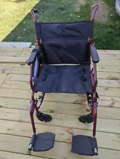 Used lightweight, foldable transport manual wheelchair for sale in WI.