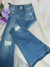 BEBE JEANS flares DISTRESSED Mid-hi rise MEDIUM WASH faded 27 NWT Flares $129