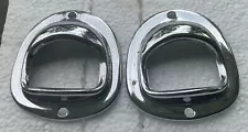 1949-51 OLDSMOBILE LICENSE PLATE LIGHT BEZEL PAIR = OEM PARTS