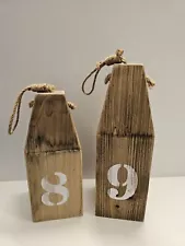 Two Decorative Wooden Buoys in Rustic colors.