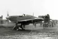 An Eagle squadron pilot tests engines & guns Hurricane fighter - 1941 Old Photo