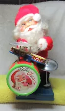 1970's battery operated Santa one man band with instruments