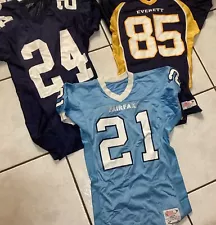 Three High School Football Jerseys , One Medium And Two Large