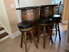 Whiskey Barrel Tables (2) and Chairs (4) - Opens for Bar Storage Inside