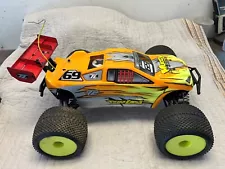 team Losi Muggy nito and Traxxas 4-tec nito