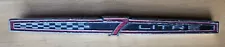 1966 Ford Galaxie 7 Litre glove box emblem