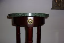 MARBLE TOP/WOODEN TABLE (NEW). Green marble. dark brown wood. gold embellishment