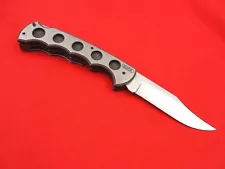 Buck 186 titanium 8 5/8" OA folding knife