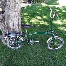 Brompton 3 Speed Racing Green Mid Bar, with rack and Adjustable Seat , And Etc