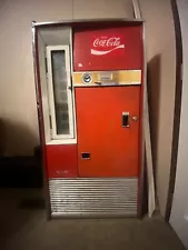 Large Red 1962 antique coke machine. still works , comes with key !