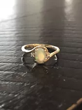 Beautiful Opal Ring With 2 Diamond Chips