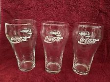 Three vintage Coca-Cola glasses