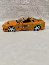 Jada Toys - Fast and Furious Brian's Car Toyota Supra 1995, Scale 1:24 - Orange