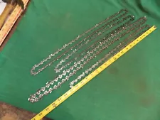 Lot of 4 used chainsaw chains. 3 Oregon, 1 Stihl. Different sizes