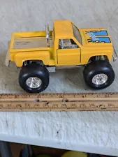 Yellow Chevy 4x4 Stepside Truck