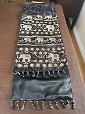 Table Runner With Gold Elephants On Black Backdrop