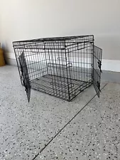 Selling 2 Dog Cages both Large and small - Used in good condition