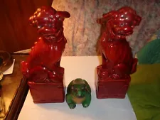 ceramic items from house salvage, frog, 2 ceribus hounds.