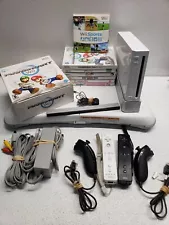 Nintendo Wii Console With Mario Kart, Wii Fit & Board, Wii Sports, And More