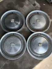 Set of 4 1969 Cadillac hubcaps for sale. Good condition