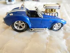 MUSCLE MACHINES - '64 SHELBY COBRA - 1:64 - DIECAST - BLUE