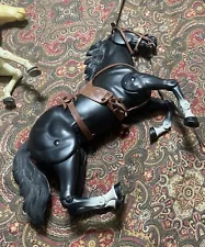 Pair of vintage Marx toy horses, jointed, one with stand