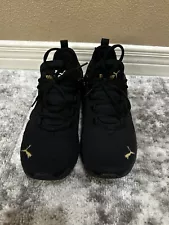 Size 9.5 - PUMA Black and Gold