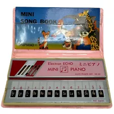 Vintage Electron Echo Mini Piano With Pink Cover Song Book Extra Batteries