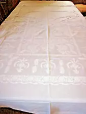 Wt. Madira linen table cloth w/ wt. floral embroidery 110" x 78"