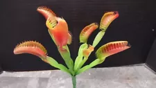 Artificial venus fly trap green with some burgundy highlights