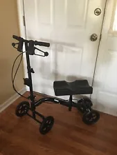 4 WHEEL STEERABLE WALKER/KNEE SCOOTER; TWO HAND-BRAKES; ADJUSTABLE; NO CRUTCHES 